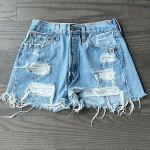 High-waisted Levi’s 501 denim shorts with rips, W 28 L 32 (fits like a size 25)